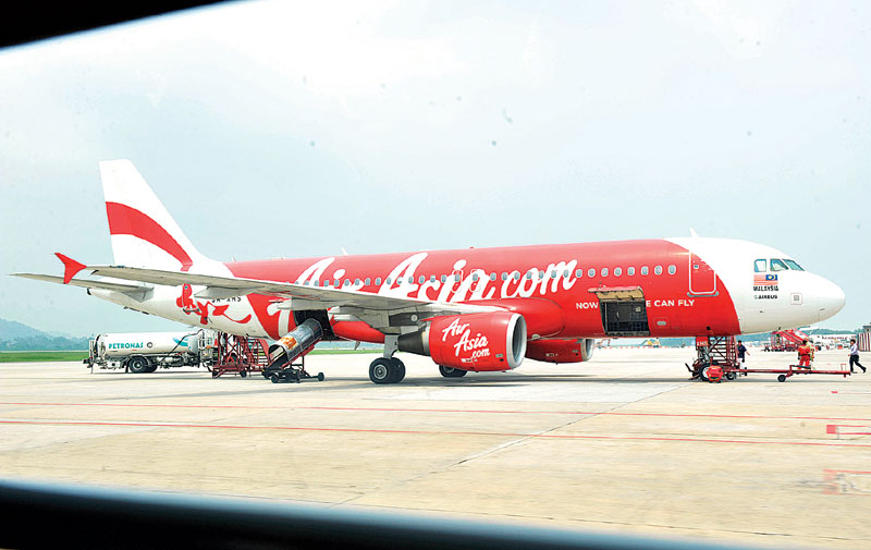 亚航柜台登机只限特定乘客 从4月起不再收费